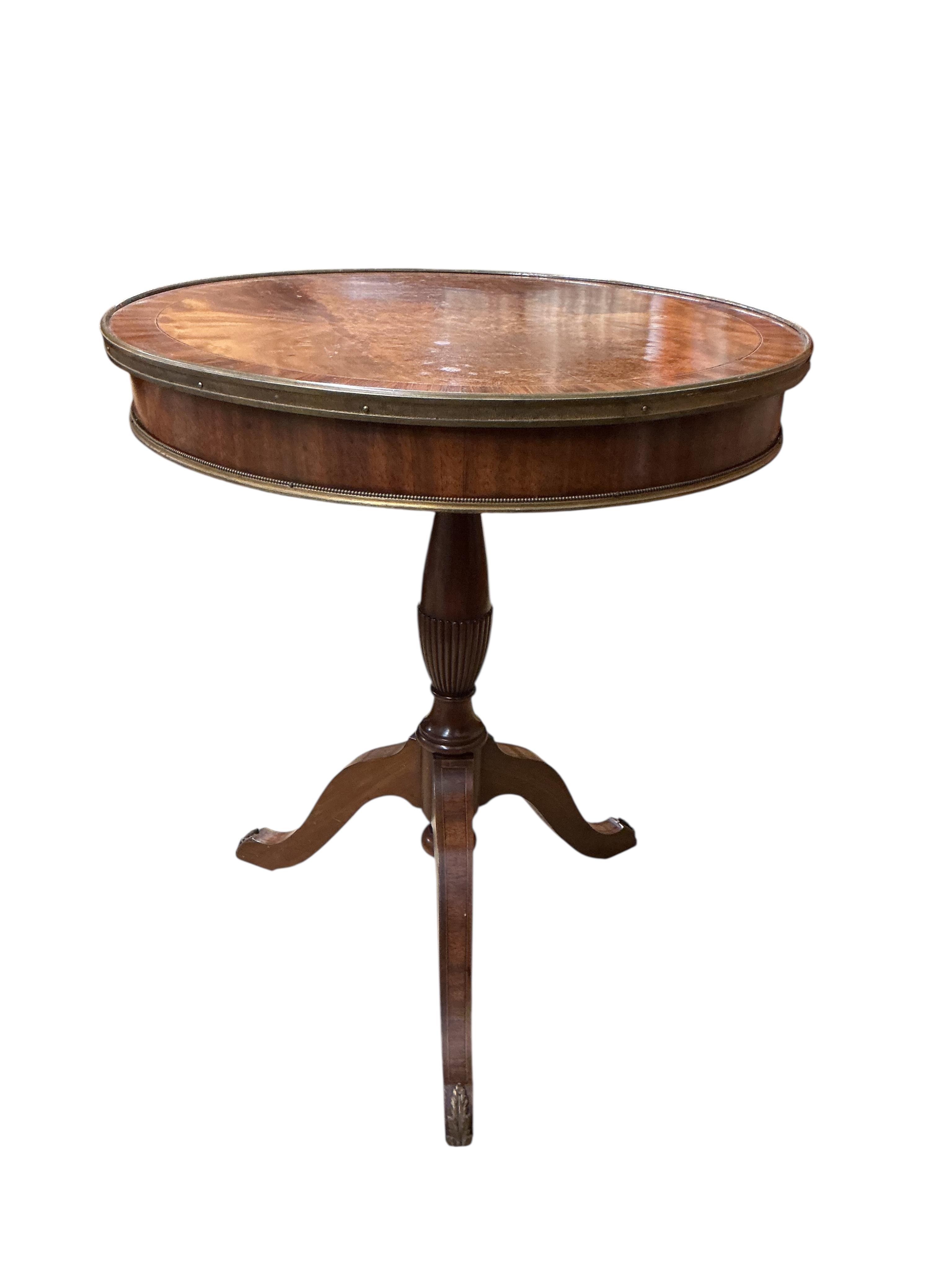 A George III style circular banded mahogany centre table, diameter 60cm, height 70cm